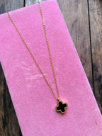 Reversible clover pendant